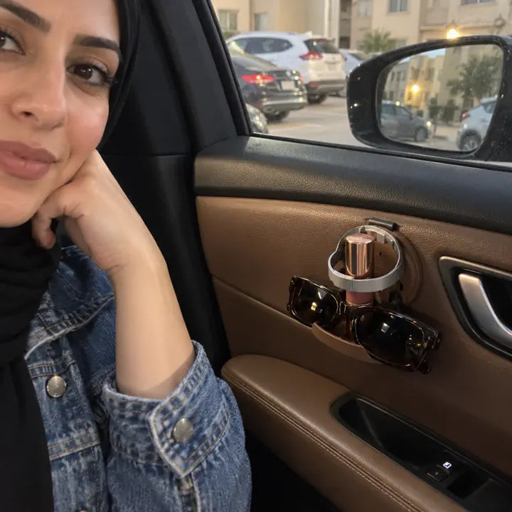Customer using the folding car cup holder