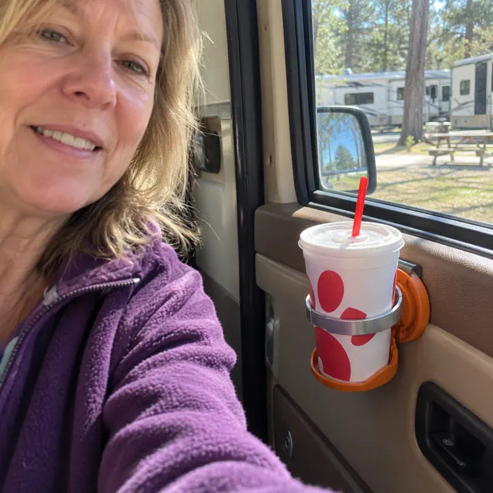 Customer using the folding car cup holder