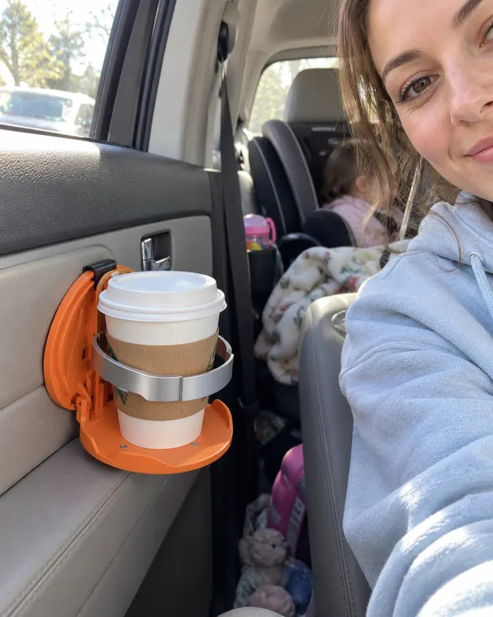 Customer using the folding car cup holder
